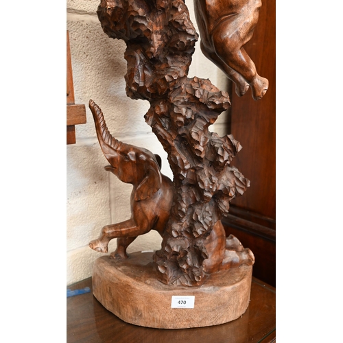 470 - An African carved wood arrangement of acrobatic elephants, 103 cm