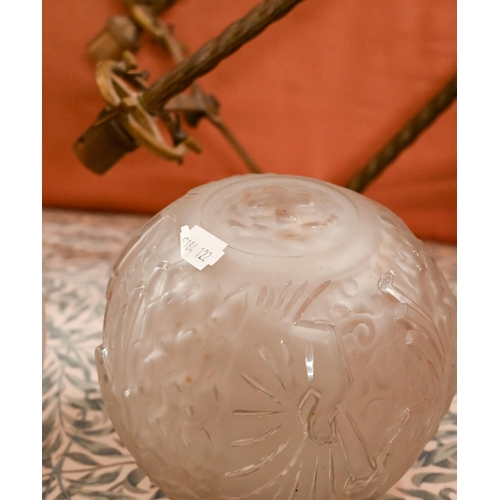 474 - An Art Deco brass ceiling light with three frosted glass globe shades, 75 cm high approx