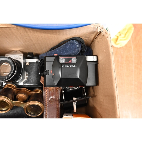 477 - A cased pair of Trentor 10 x 50 binoculars to/w a Pentax S1a slr camera, Kodak SIX-20 folding camera... 