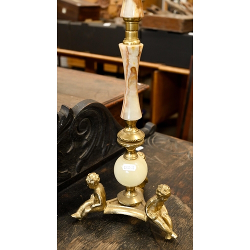 48 - A brass and onyx smoker's companion stand with decorative figures