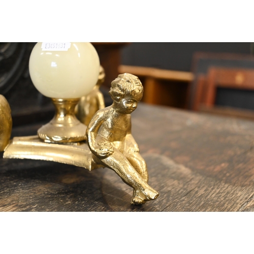 48 - A brass and onyx smoker's companion stand with decorative figures