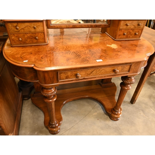 51 - A Victorian walnut duchess dressing table with swing mirror, four short drawers and frieze drawer, o... 