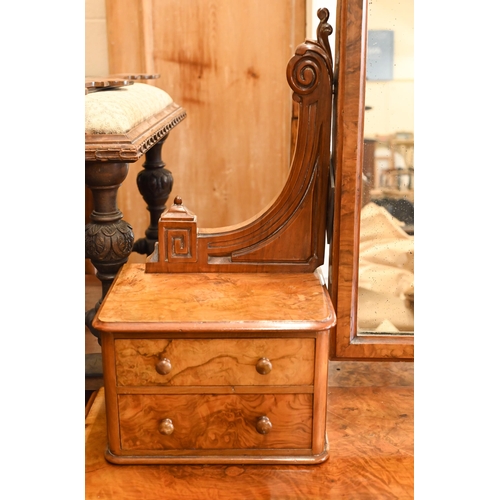 51 - A Victorian walnut duchess dressing table with swing mirror, four short drawers and frieze drawer, o... 