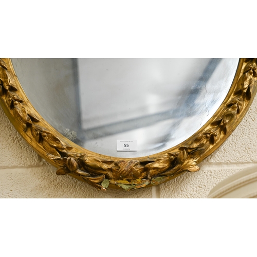 55 - A 19th century wall mirror, the gilt gesso framed embellished with ribbons and foliage, 87 x 64 cm