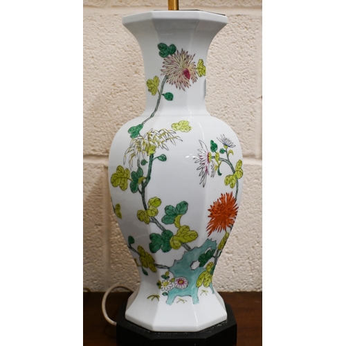 57 - An octagonal baluster ceramic table lamp decorated in the famille vert palette, 49 cm to/w three ala... 