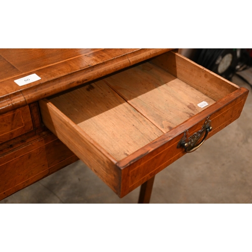 60 - A Georgian walnut side table with two short and one long drawer, on square chamfered supports, 85 cm... 