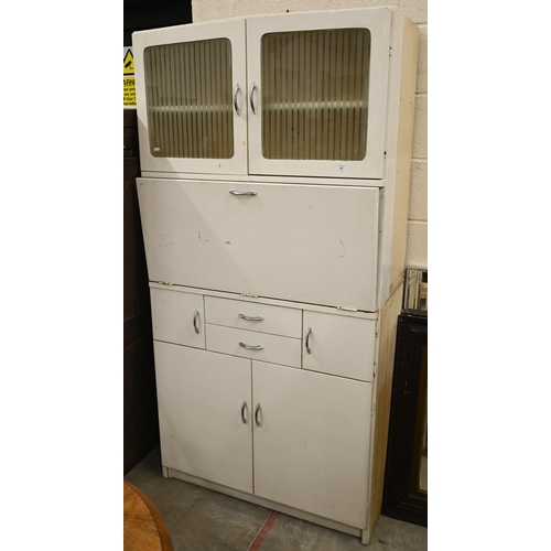 63 - A 1950s vintage kitchen cupboard with etched glass upper doors and melamine drop-front enclosing sto... 