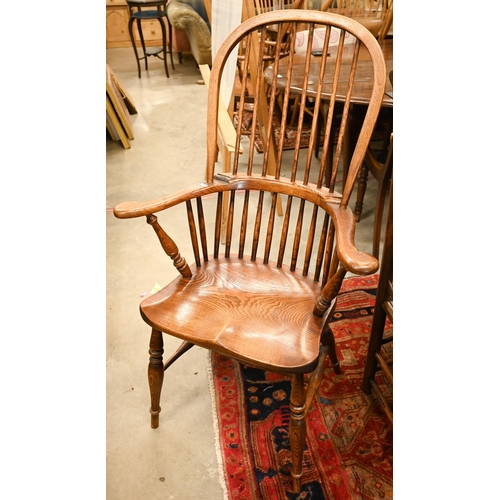 74 - A pair of stained elm and ash spindle back Windsor chairs, 70 cm w x 44 cm d x 110 cm h o/a