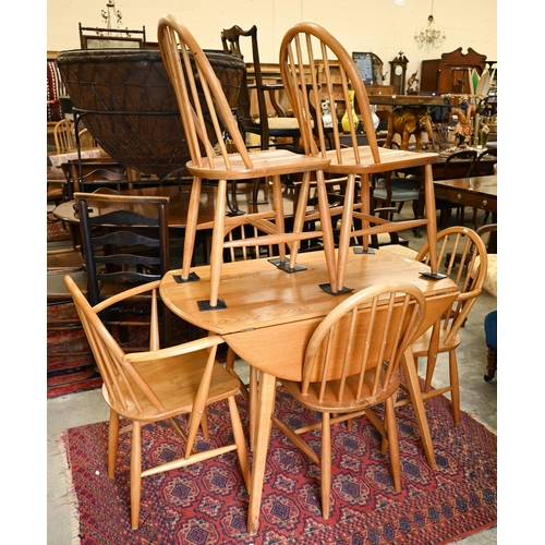 76 - AMENDMENT - A mid-century Ercol Windsor elm and beech dining table with elm drop leaf top (replaced ... 