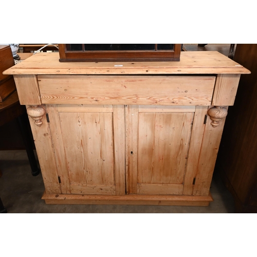 83 - A pine chiffonier with panelled doors below a single drawer, 112 cm w x 33 cm d x 93 cm h