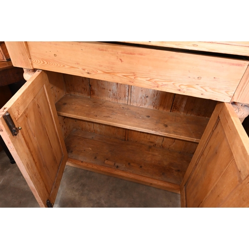 83 - A pine chiffonier with panelled doors below a single drawer, 112 cm w x 33 cm d x 93 cm h