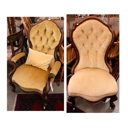 85 - A pair of Victorian rosewood framed his and hers lounge chairs, yellow button back dralon fabric