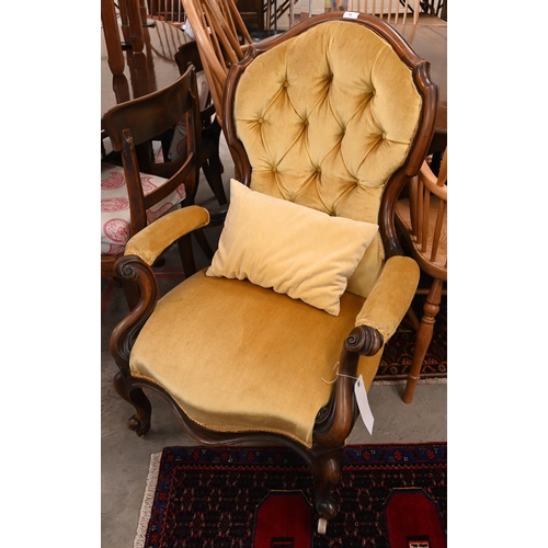 85 - A pair of Victorian rosewood framed his and hers lounge chairs, yellow button back dralon fabric