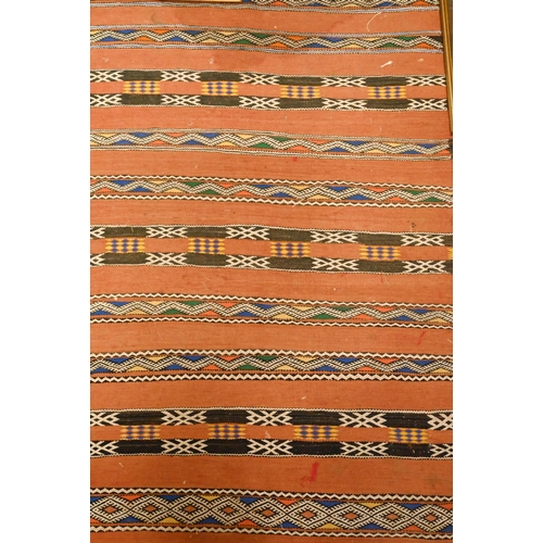 86 - An Afghan Baluch bird design rug, brown ground, 150 cm x 93 cm to/w a soumak rug with geometric band... 