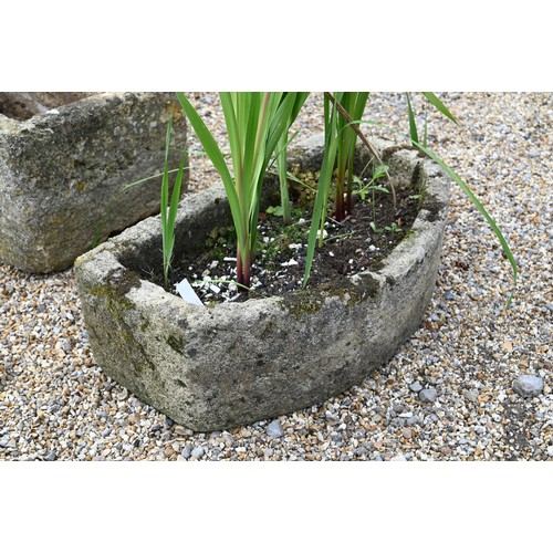 20A - An old weathered stone demi lune shaped planter, 76 cm w x 40 cm d x 24 cm h