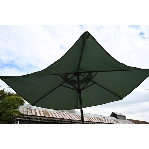 25A - A metal garden patio set with circular table, 120 cm dia. x 72 cm h anf four chairs c/w parasol in c... 