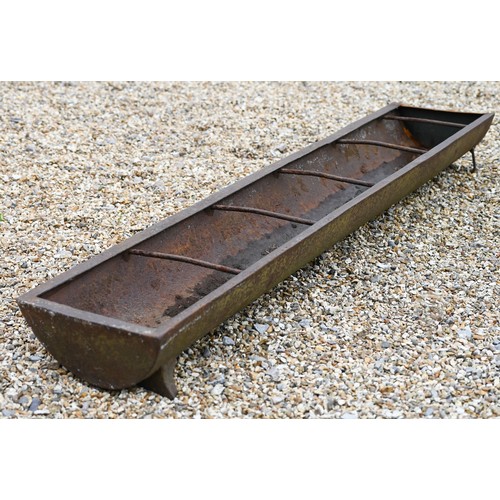 4 - A cast iron feeding trough or garden planter with dividing bars, 164 cm w x 30 cm d x 16 cm h