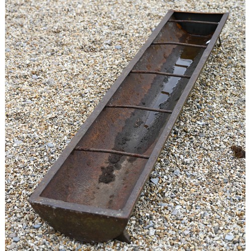 4 - A cast iron feeding trough or garden planter with dividing bars, 164 cm w x 30 cm d x 16 cm h