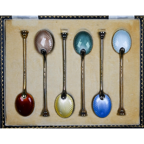 125 - A cased set of six harlequin-enamelled and silver gilt coffee spoons, William Suckling Ltd., Birming... 