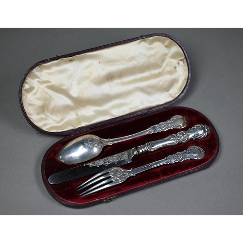 128 - A Victorian cased silver Christening knife, spoon & fork, the knife with silver blade and loaded... 