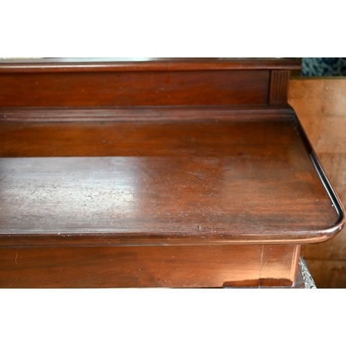 705 - A good and large William IV Irish mahogany console or silver table, the rectangular dished top with ... 