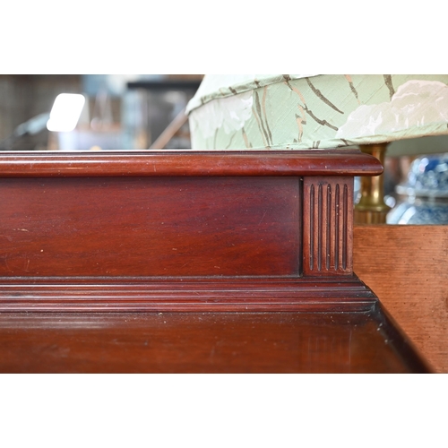 705 - A good and large William IV Irish mahogany console or silver table, the rectangular dished top with ... 