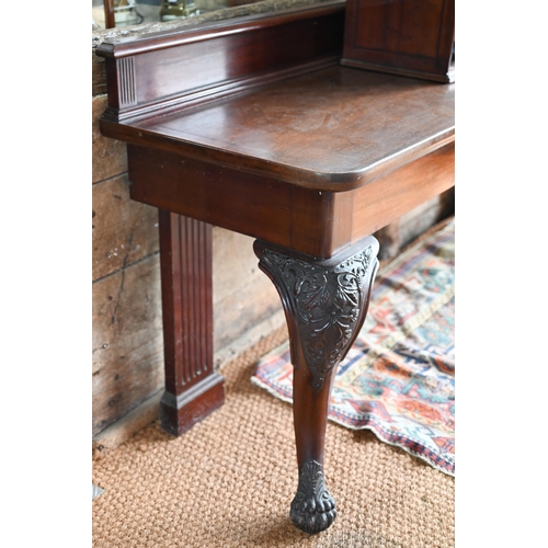 705 - A good and large William IV Irish mahogany console or silver table, the rectangular dished top with ... 