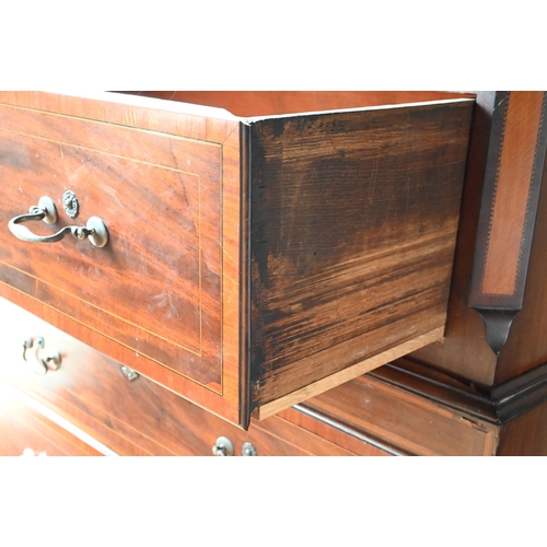 719 - A Victorian cross banded and inlaid bright mahogany chest on chest, the dentil moulded cornice over ... 