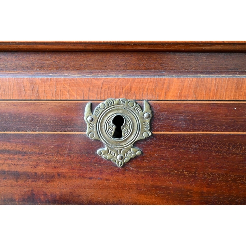 719 - A Victorian cross banded and inlaid bright mahogany chest on chest, the dentil moulded cornice over ... 