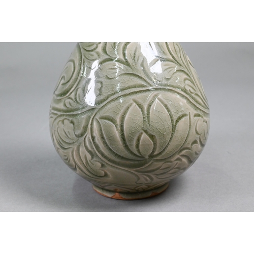 377 - A Chinese Yazhou Northern Celadon vase with incised floral and foliate decoration under the pale oli... 