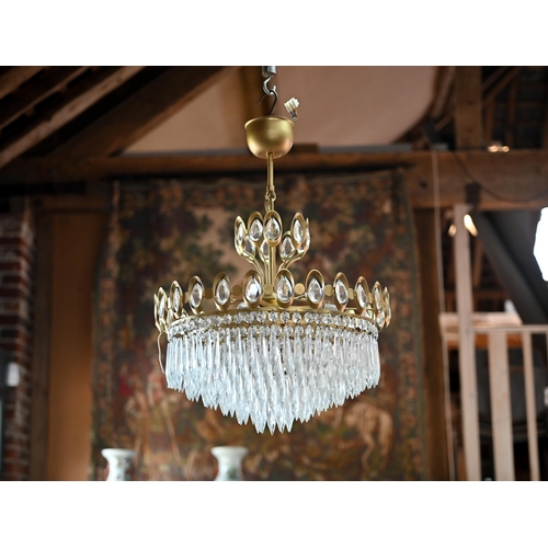 750A - A good pair of brass framed lead crystal chandeliers by Joska, circa 1970's, each approx. 40 cm dia.... 