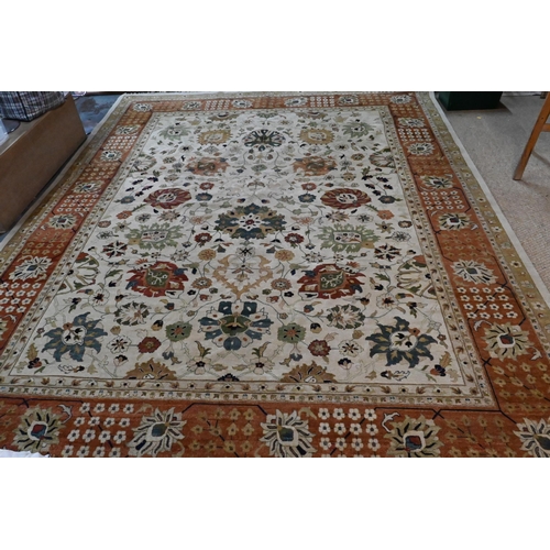 612 - A large contemporary Indo-Persian Tabriz design carpet, the camel ground with floral medallions link... 