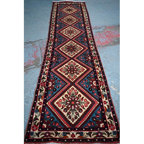 617 - A contemporary North West Persian Rudbar runner, the mid-blue lozenge pole design on camel ground, 3... 