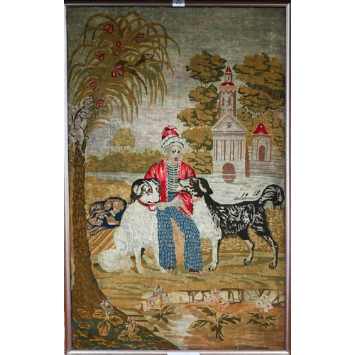 618 - A Georgian needlework panel depicting a boy with dogs in a lake landscape with chapel - by repute, o... 