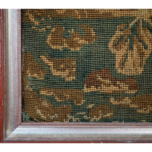 618 - A Georgian needlework panel depicting a boy with dogs in a lake landscape with chapel - by repute, o... 