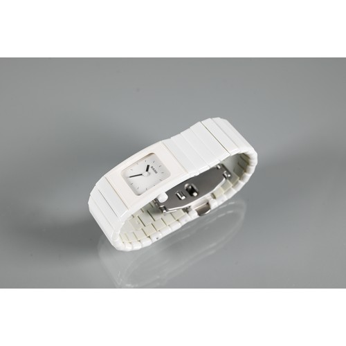178 - Rado, a white cased lady's wristwatch, quartz movement, on deployment bracelet, with box, manual and... 
