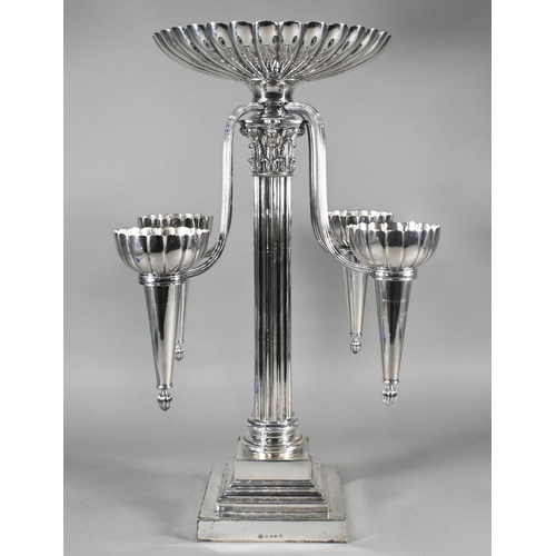 1 - A large Elkington & Co. electroplated centrepiece epergne, surmounted by a fluted bowl flanked b... 