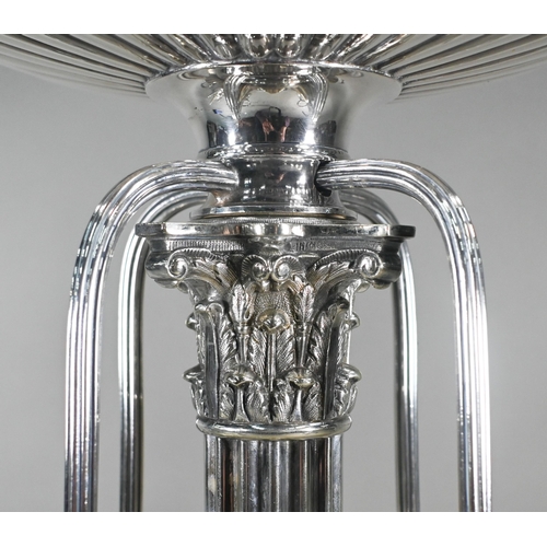 1 - A large Elkington & Co. electroplated centrepiece epergne, surmounted by a fluted bowl flanked b... 