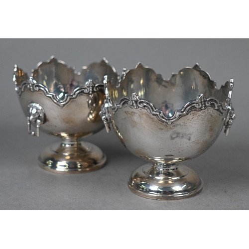 106 - A pair of silver bonbon bowls in the form of miniature monteiths with shaped rims and lion mask and ... 