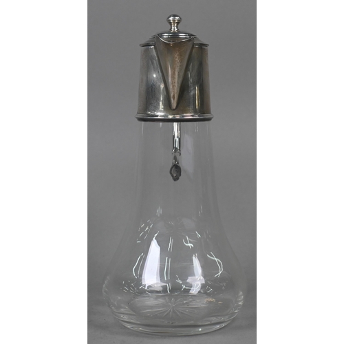 107 - A glass claret jug with star-cut base and silver collar, hinged cover and scroll handle, William Hut... 