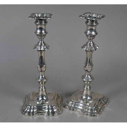 108 - A pair of Edwardian loaded silver baluster candlesticks engraved with 35th Poona Battalion L.C.A. Re... 