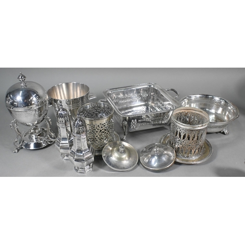 11 - A quantity of electroplated wares, including large tray, ice bucket with tongs, sauce boats, egg-boi... 