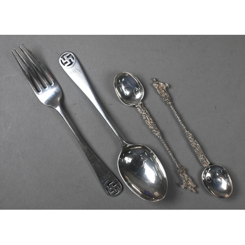 110 - A cased silver Christening spoon and fork with pierced swastika emblems (originally a symbol of pros... 