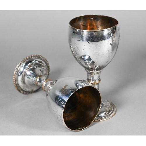 12 - A pair of Georgian Old Sheffield Plate goblets with ovoid bowls, on stemmed bases, 16cm high, to/w a... 