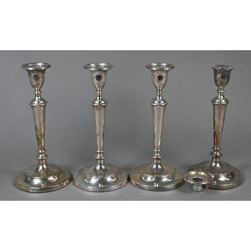 123 - A set of four loaded silver baluster candlesticks with detachable grease-pans, M C Hersey & Son ... 