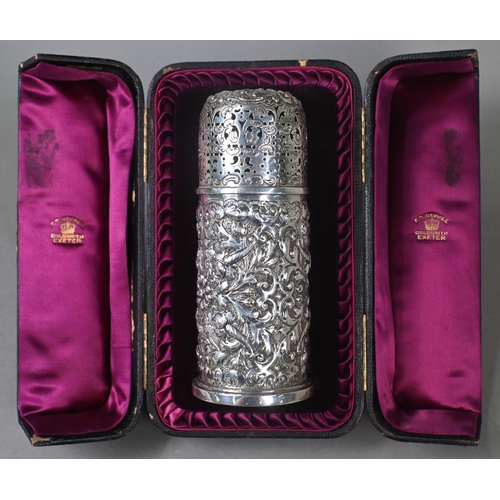 139 - A Victorian cased silver cylindrical sugar caster in the Carolean manner, with pierced domed top, th... 