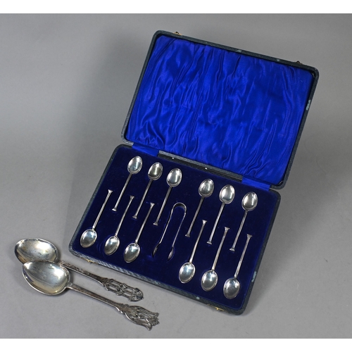 143 - Two silver serving spoons with pierced finials, Harrison Fisher & Co, Sheffield 1920, to/w a cas... 