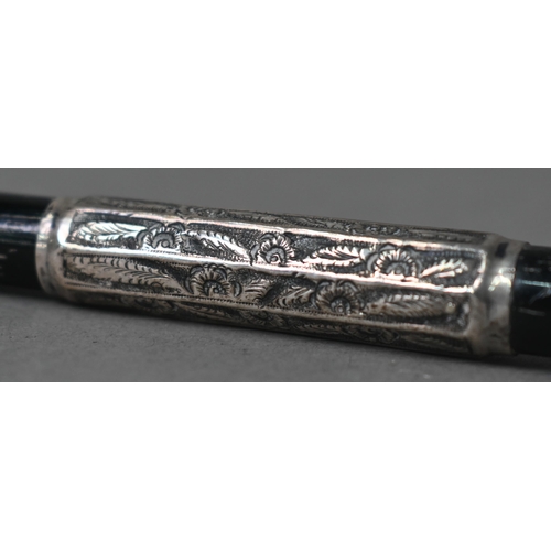 147 - An Edwardian silver-mounted ebony 'Handy Pocket Baton' two-piece conductor's baton, unscrewing in th... 