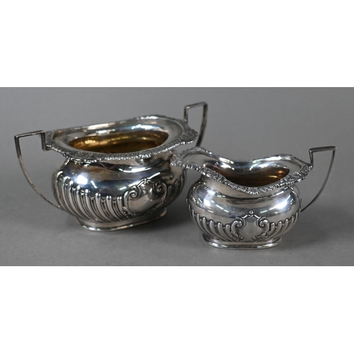 164 - A late Victorian silver four-piece tea service of half-reeded oblong design, John Round & Son Lt... 