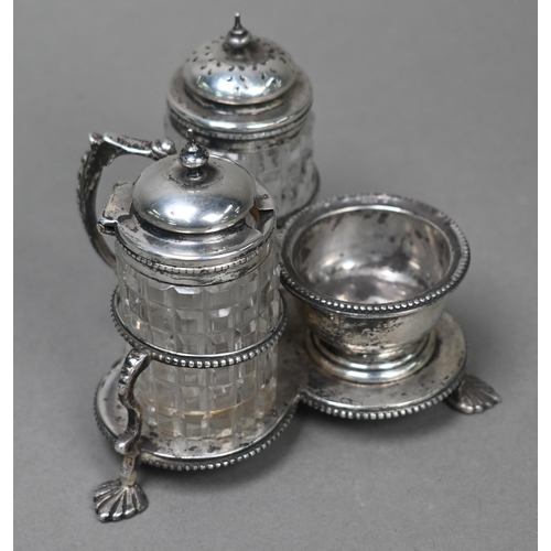 165 - A Victorian silver trefoil cruet stand with two cut glass pots for mustard and pepper, the salt atta... 